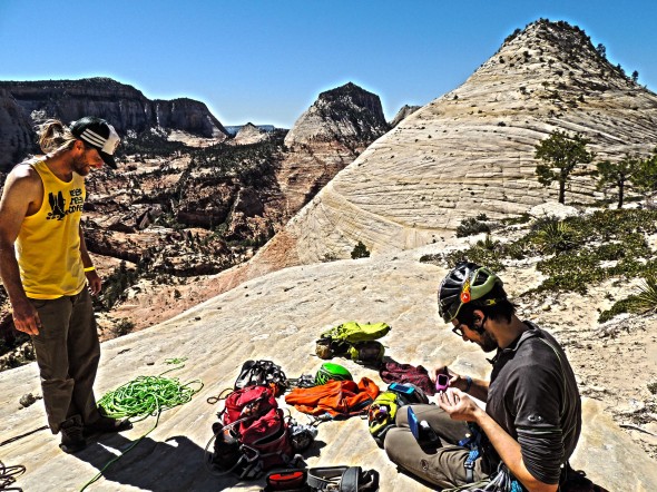 A quick blood sugar measurement before getting roped up at the base of the route (Photo Chris Mahoney)