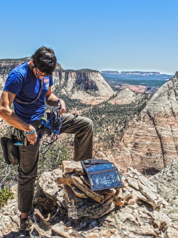 Capturing some sunshine to recharge on the summit--thanks to Goal Zero for the power!